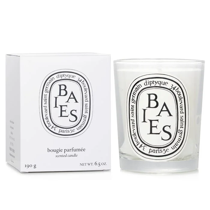 Diptyque Baies 190g candle in a clear glass jar beside its white box