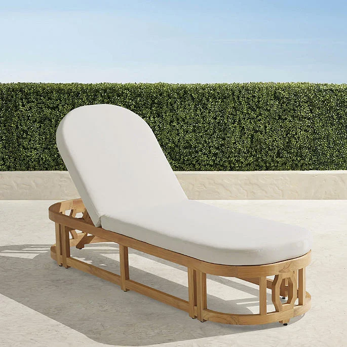 Frontgate Porticello natural teak chaise with a cream cushion