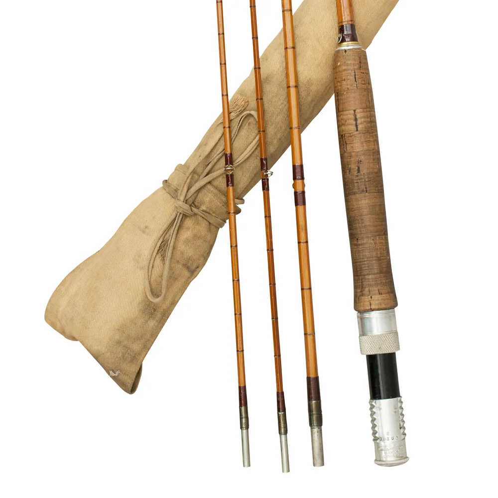Vintage Hardy De Luxe split-cane fly rod with cloth sleeve
