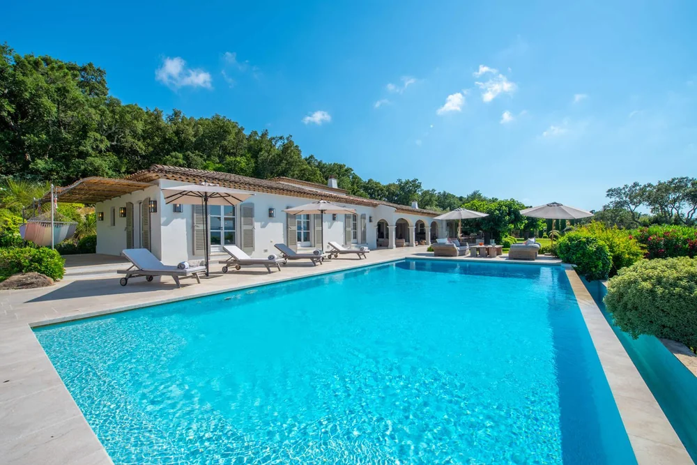 White Saint-Tropez villa with an outdoor swimming pool