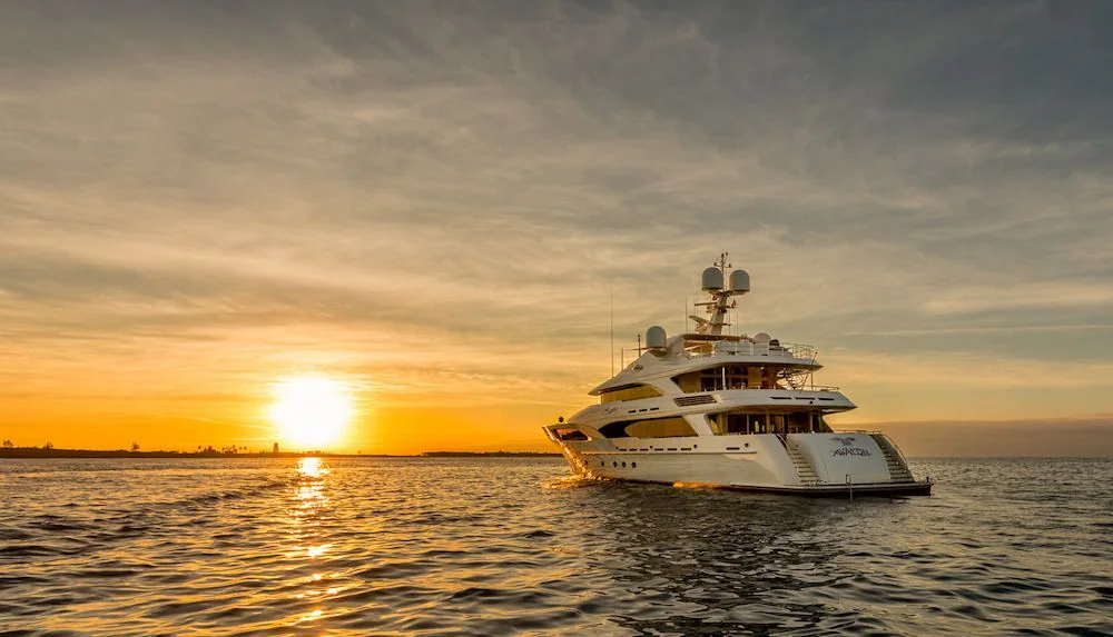 Luxury motor yacht at sea from Boatbookings charter guide